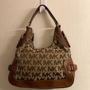 “Michael” Michael Kors handbag